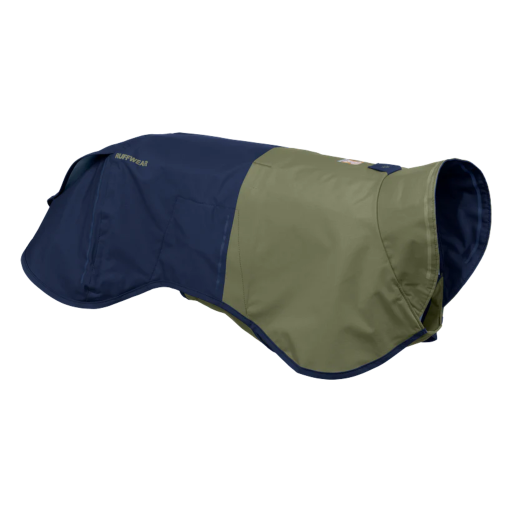 Two-tone navy and green dog coat on a white background