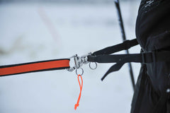 Close-up of Non-stop dogwear Loype Belt Pro skijoring belt attachment system with quick-release carabiner for secure dog connection.