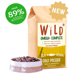 Wild Pet Food Herring 80:20 Cold-Pressed Complete Dog Food in eco-friendly packaging with a bowl of kibble, rated 89% by dog food experts.