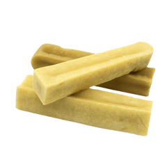 Petello Yak Cheese Dog Chew sticks stacked, showcasing natural texture and handcrafted quality for healthy dog snacking. Ideal for long-lasting chewing.