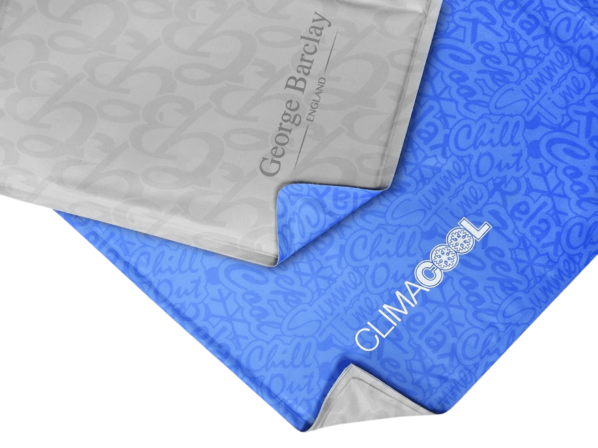 Close-up of George Barclay ClimaCOOL Self Cooling Dog Mat in blue and grey color options, highlighting dual-sided cooling surface design.