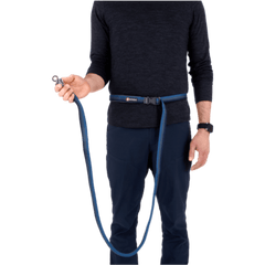 Person wearing Ruffwear Roamer™ Leash around waist in hands-free mode, ideal for running or hiking with dogs.